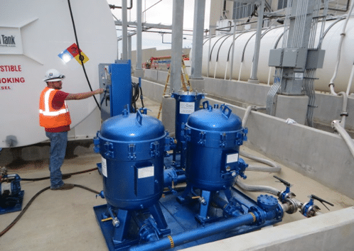an external pump performs an oil flush